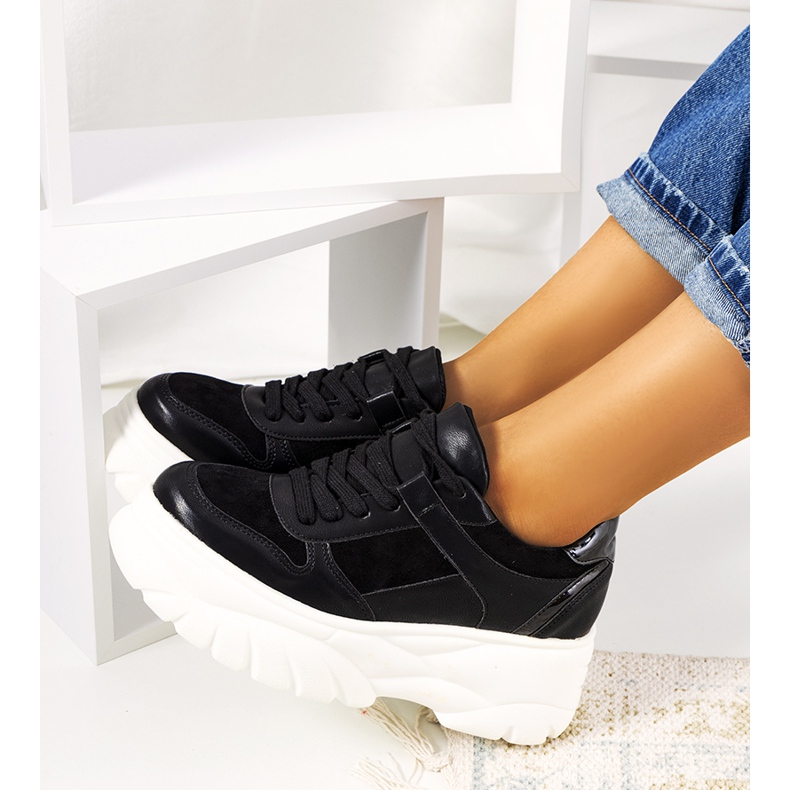 Black sports sneakers with a high Mellis sole 1