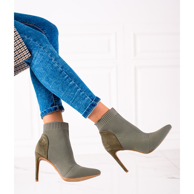 Matching boots on a S. Barski heel green 1