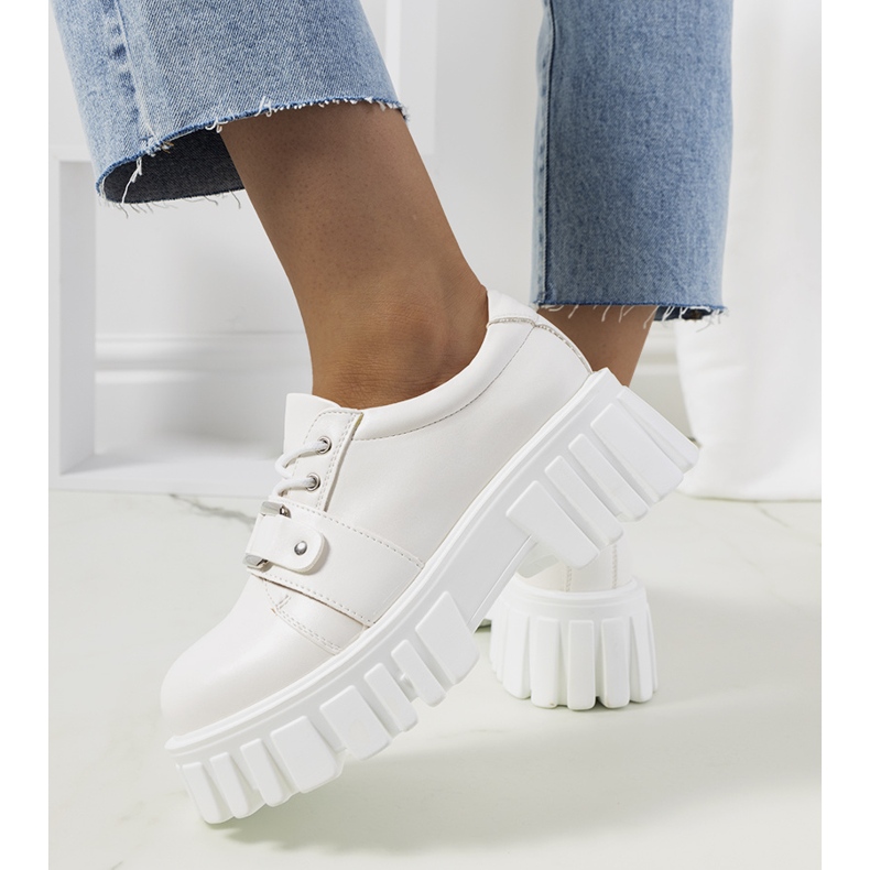 White shoes on a tractor sole from Sallie 1