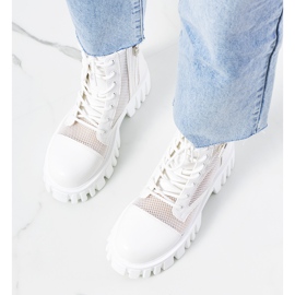 White boots with an openwork Potts upper 1