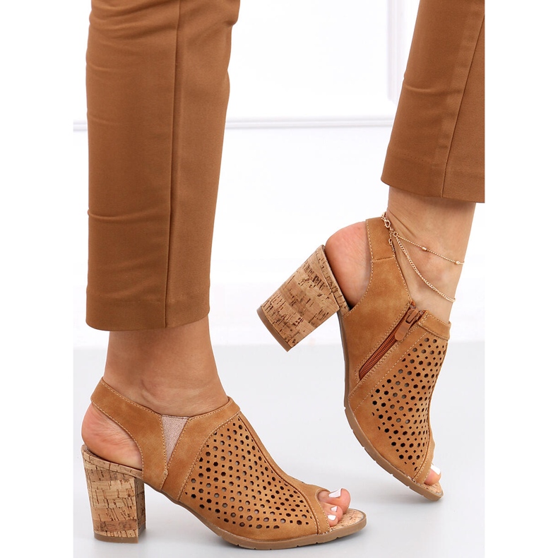 Openwork sandals on the Assia Camel post brown 1