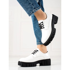 White shoes on the La.Fi platform 1