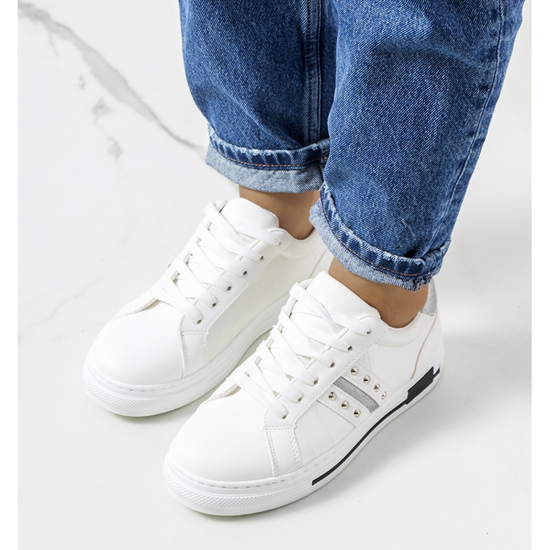 White sneakers with Luus studs 1