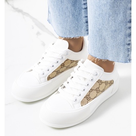 White and brown sneakers on the Birkett platform 1