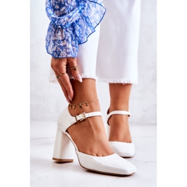 PG1 Fashionable Lacquered Pumps On A White Maoris Bar 1