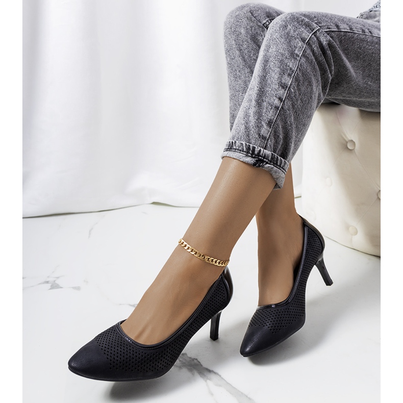 Black openwork pumps on a Carling stiletto heel 1