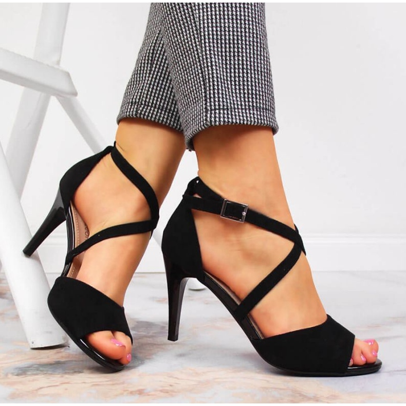 Black sandals on a high heel W Sergio Leone 2