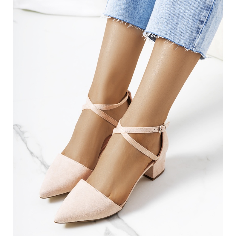 Beige pumps on the Hyde post 1