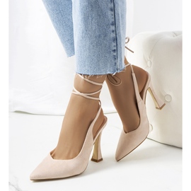 Beige lace-up pumps on the Lotti post 1 Beige lace-up pumps on the Lotti post 1