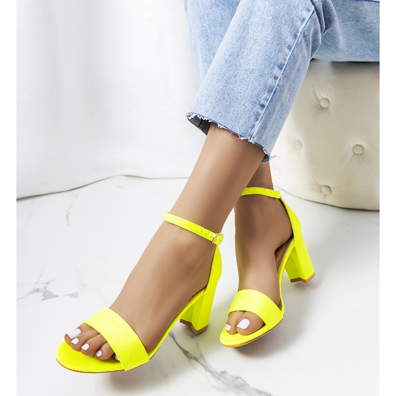 Neon yellow sandals on the Karella post 1