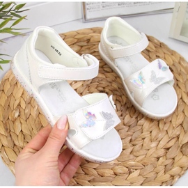 Velcro white sandals At the American Club 1
