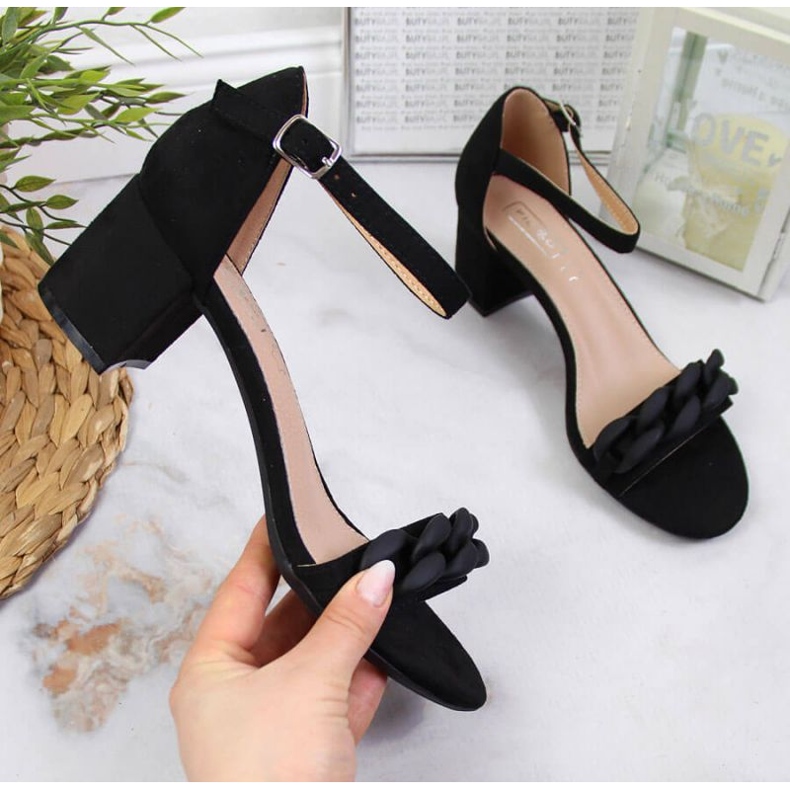 Black Sandals on a post with a chain W Filippo 1