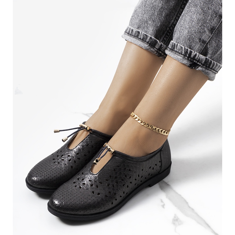 Black openwork shoes from Holm 1