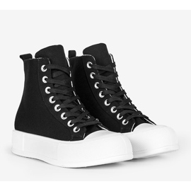 Black sneakers on a high Natasha sole 1