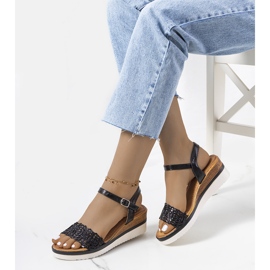 Black sandals with a decorative Kirk strap 1