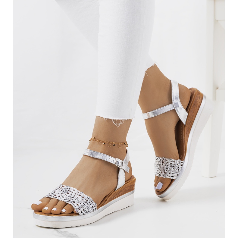 Silver sandals with a decorative Kirk strap 1