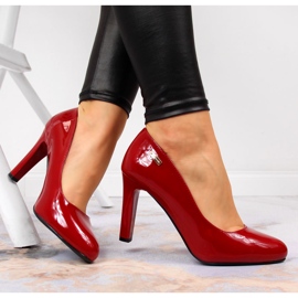 Red pumps lacquered on the Sergio Leone post 1