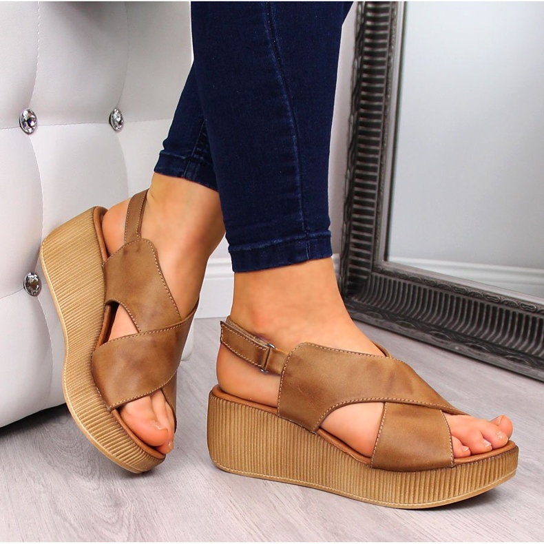 Women's leather sandals on a brown wedge Dolce Pietro 1