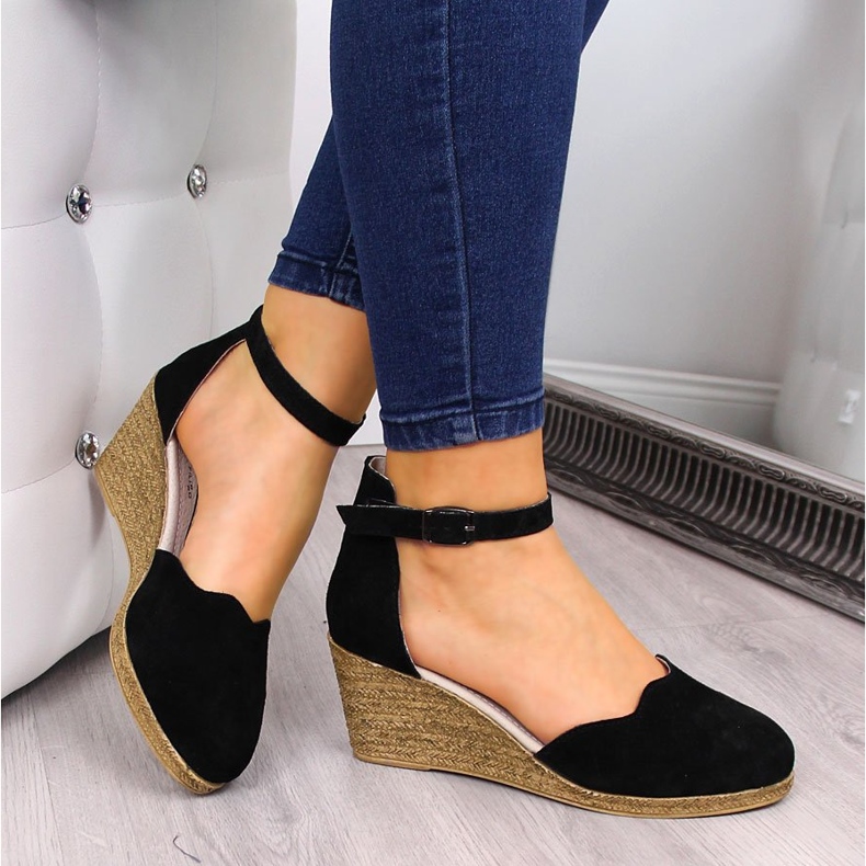 Leather women's sandals on a black wedge Filippo 1