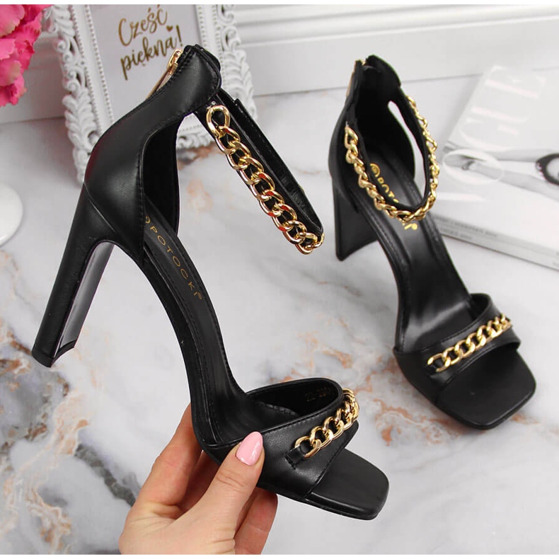 Black Potocki women's sandals on a post with a chain 1