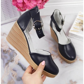 Leather women's sandals on a navy blue wedge Filippo 1