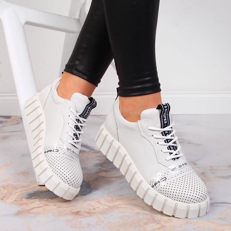 Women's leather shoes on the white Artiker platform 1