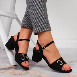 S.Barski Black women's sandals on a post with an ornament by S. Barski 1