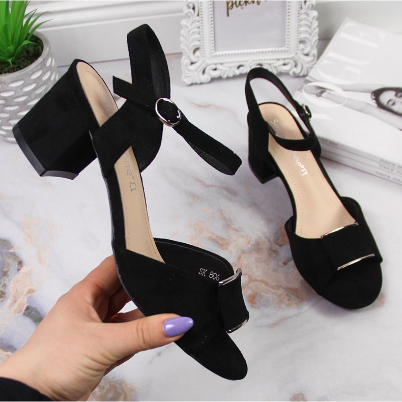 Black Sergio Leone sandals on the post 1