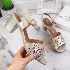 Women's sandals on the gold post Jezzi golden 1