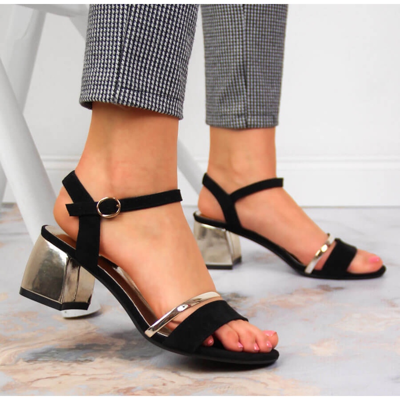 Black and gold sandals on the post by Sergio Leone golden 2