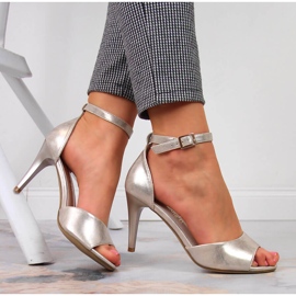 Women's sandals on a gold high heel Sergio Leone golden 1