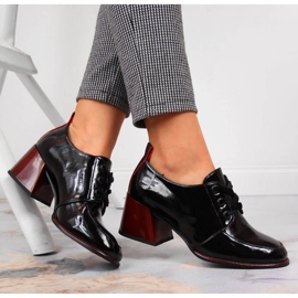 Leather women's shoes on a black block Filippo 1