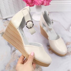 Women's leather sandals on a beige Filippo wedge 1 Women's leather sandals on a beige Filippo wedge 1