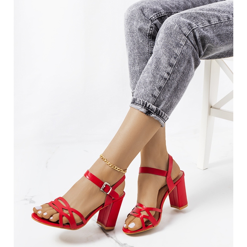 Red sandals on a Dolling post 1