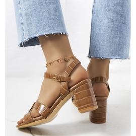 Brown sandals on the Haiden post 2