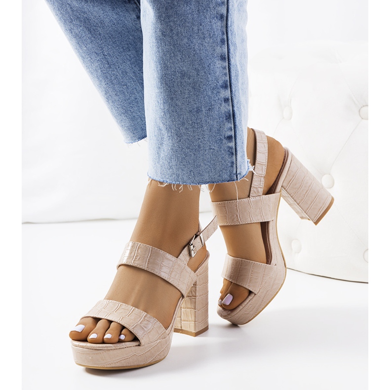 Beige sandals on the Liv post 1