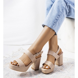 Beige sandals on the Liv post 2