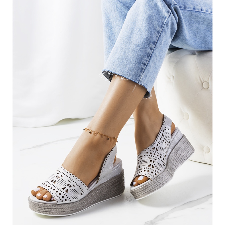 Silver openwork sandals on a Bible wedge heel 1