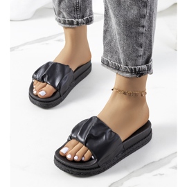 Black slippers on the Baldwin platform 1