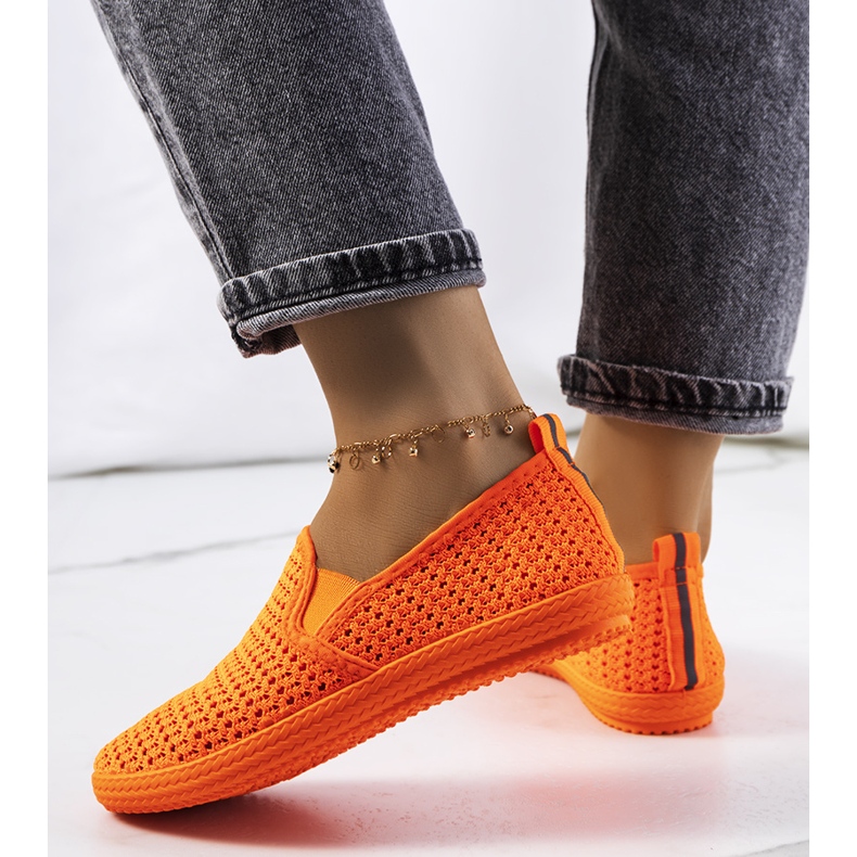 Mallory's orange openwork sneakers 1