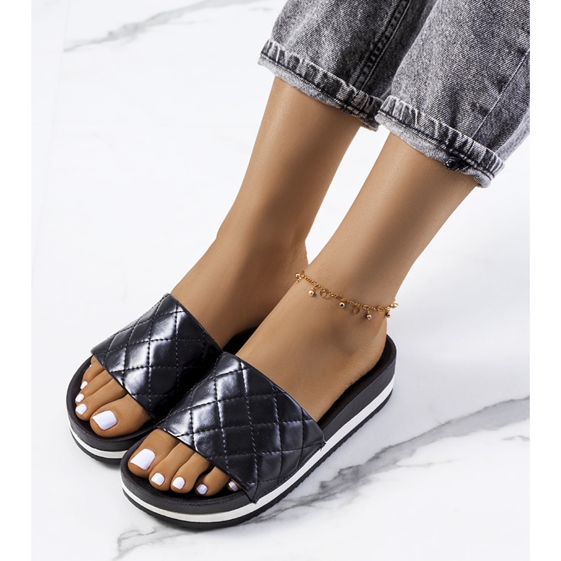 Black quilted Hassell slippers 1