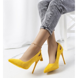 Yellow heels with decorative Anthe cutouts 1