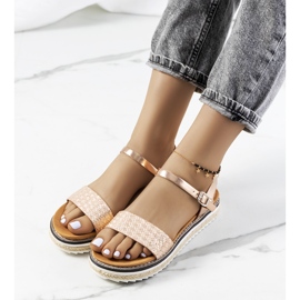 Golden sandals on an ornate Acton platform 1