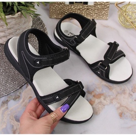 Black Velcro sports sandals At the American Club 1