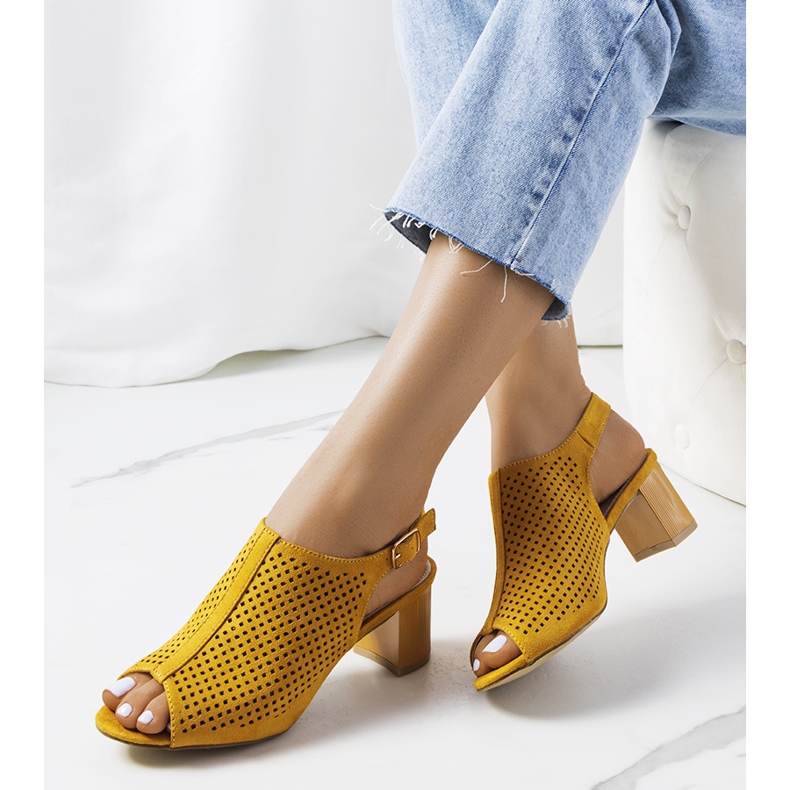 Yellow openwork sandals on a Belinda post 1