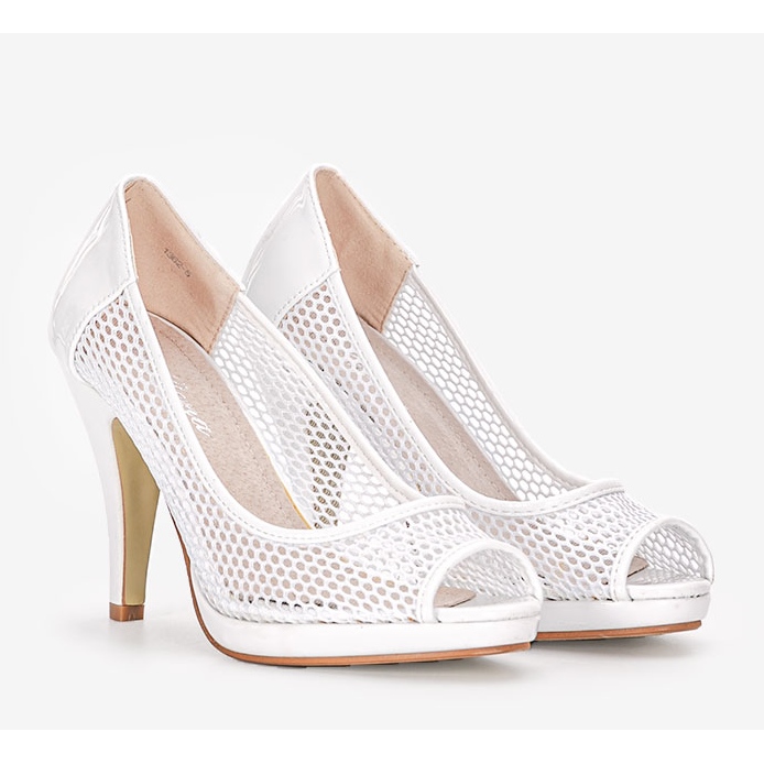 White pumps on the Ranta heel 1