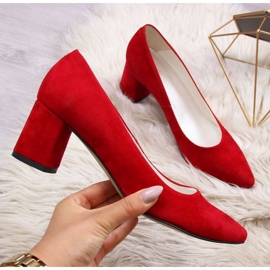 Pumps on a red suede pillar W Juma 1