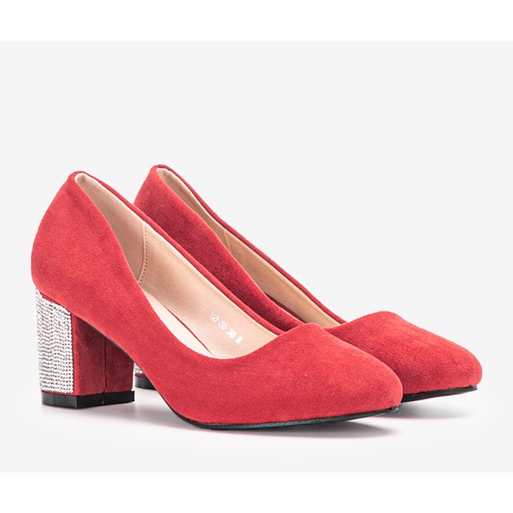 Red pumps on Goyal's post 1