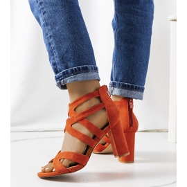 Orange sandals on a Maddox post 1