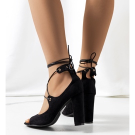 Black lace-up sandals on a Skylar post 1